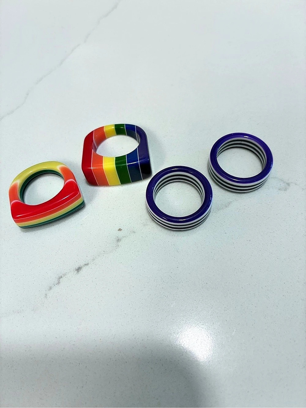NWOT 4 Rainbow Color Acrylic Ring Set